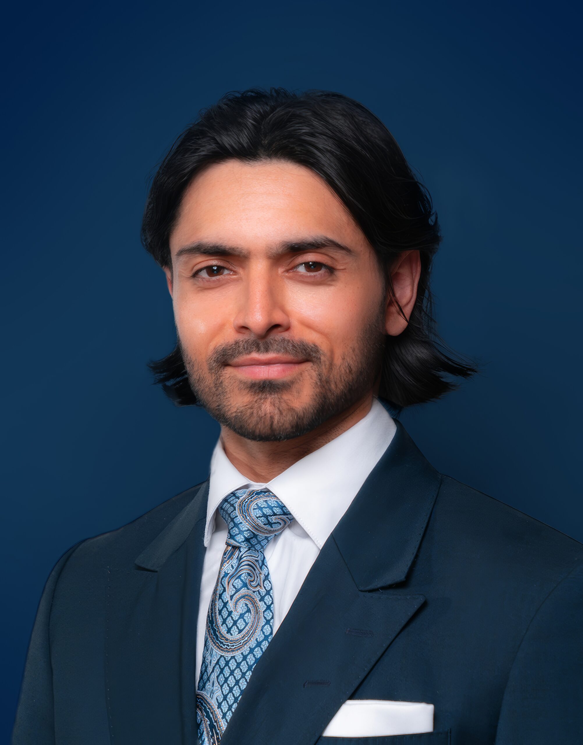 Jay Uppal posing for headshot at Fireside Psychotherapy